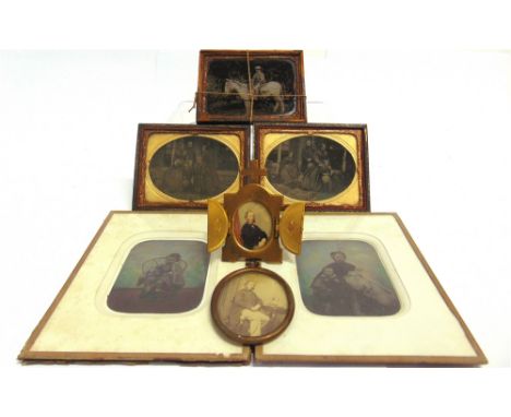 PHOTOGRAPHS - ASSORTED  Seven Victorian portraits, including two ambrotype family groups, each 7cm x 9.5cm (oval), and one in