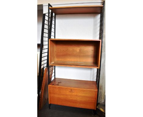 STAPLES LADDERAX: three bays of Ladderax comprising a cabinet with sliding doors, two cupboards with drop-down doors, a three