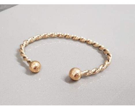 9CT GOLD TWIST TORQ BANGLE 18.4G