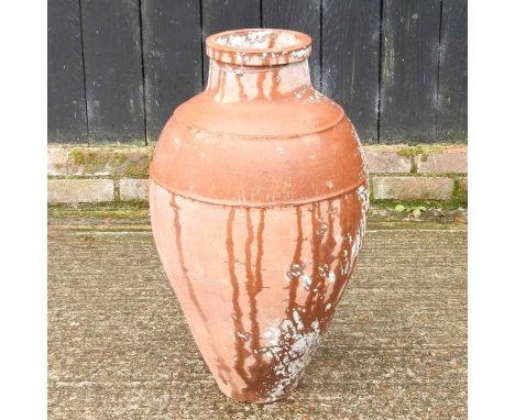 A painted terracotta garden olive jar, 64cm high