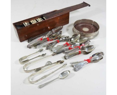 A silver wine coaster, 13cm diameter, together with a collection of silver sugar tongs, plated cutlery and dominoes game