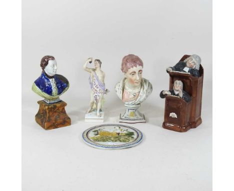 A 19th century Prattware plaque, together with two 19th century porcelain portrait busts, a Staffordshire figure of Bacchus a