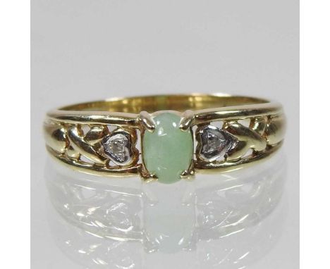 A 9 carat gold diamond and jade ring, 2.2g gross, size OCondition report: Looks complete. Clearly hallmarked.