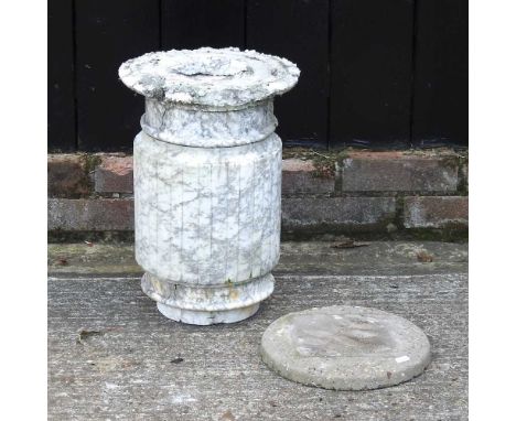 A weathered marble garden pedestal, on a cast stone plinth, 43cm high, 