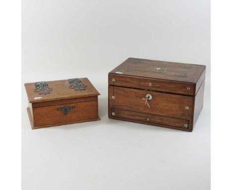 A Victorian rosewood and mother of pearl inlaid vanity case, with a fitted interior, 30cm wide, together with an oak metal bo