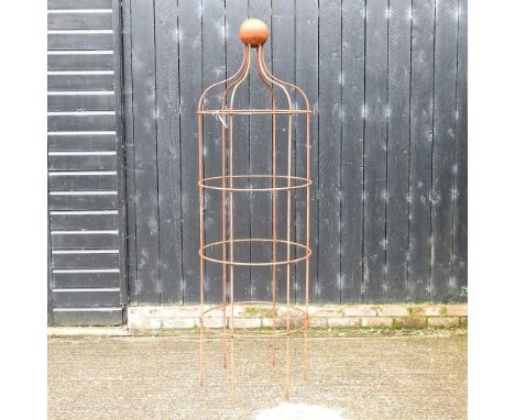 A large iron garden obelisk, 199cm high
