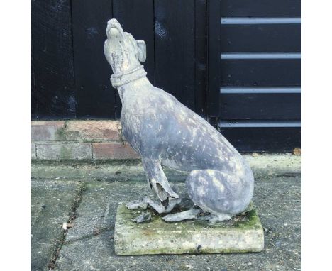 A 19th century lead garden model of a seated dog, on a stone plinth base70cm highCondition report: Damaged at the base