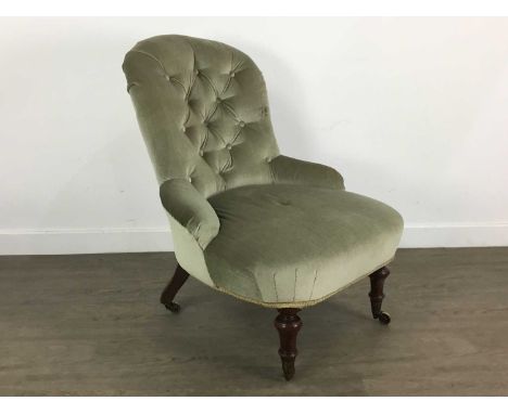 LATE VICTORIAN BUTTON BACK CHAIR upholstered in a green fabric with turned front legs, each leg with brass castors78cm high
