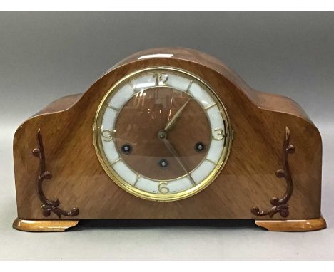 WALNUT MANTEL CLOCK the circular dial with Arabic numerals and baton hour markers38cm wide