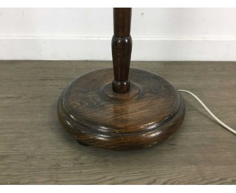 THREE STANDARD LAMPS ALONG WITH A TABLE LAMP the table lamp with cream shade Qty: 4Turned standard lamp has loose fitting. Br
