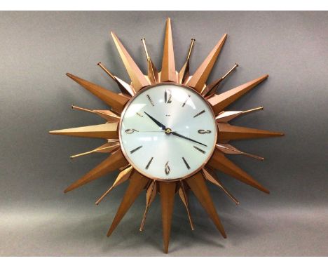 METAMEC WALL CLOCK RETRO STYLE of sunburst form with circular dial46cm diameter Good overall condition,&nbsp; some small pain