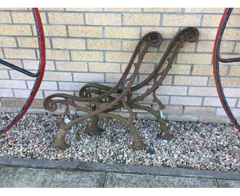 PAIR OF VICTORIAN CAST IRON BENCH ENDS part of the body of each cast in the form of branches, with the feet in the form of pa