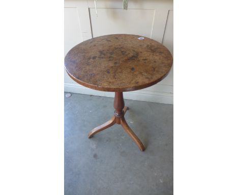 An 18th/19th century yew wood wine table with a burr walnut top - Height 59cm x Diameter 48cm - Historic woodworm holes, legs