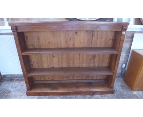 A pine/oak three shelf bookcase with two adjustable shelves - 150cm x 115cm