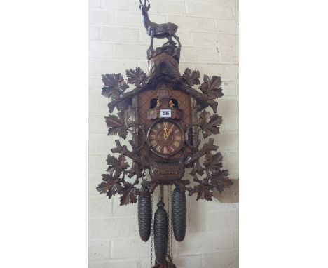 A good quality cuckoo clock with a three train modern musical movement playing Edelweiss