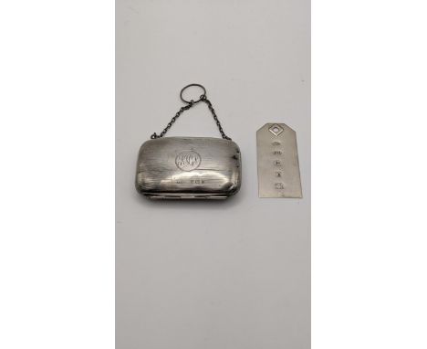 A silver coin case hallmarked Birmingham 1919, together with a silver ingot pendant total weight 63.1gLocation: 