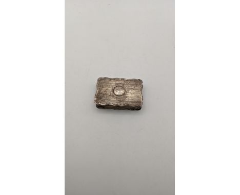 A silver snuff box having engine turned decoration, 41.6gLocation: 