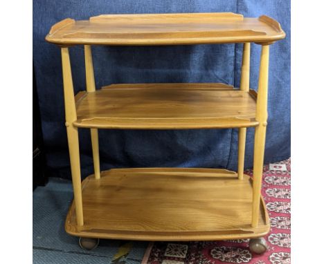 A mid 20th century Ercol blonde elm and beech three-tier trolley 77cm h x 71.5cm w Location: 