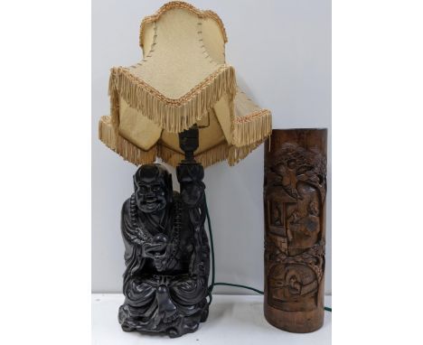 An early 20th century Chinese bamboo brush pot, together with a Chinese carved Buddha table lamp Location: 