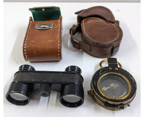 A World War I E Koehn compass and case with opera glassesLocation: 