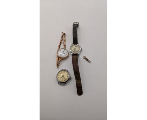 A 9ct gold ladies manual wind wristwatch, on a 9ct gold expanding bracelet, together with a yellow metal Bulldog clip and two