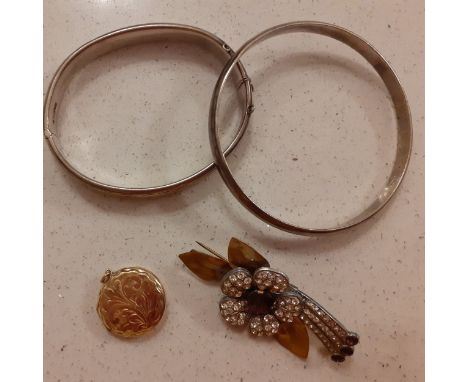 Charles Horner- An engraved CH silver bangle (safety chain missing), 17.7g together with another silver bangle, 26.8g, a 9ct 