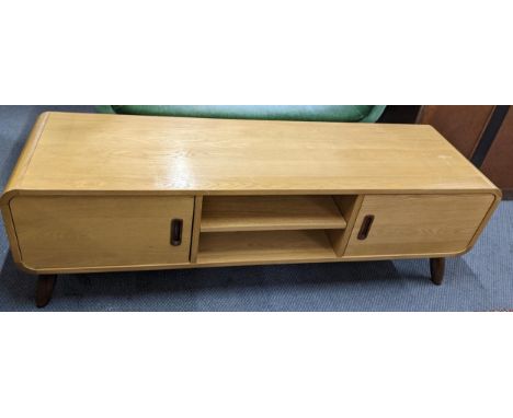 A modern Danish design light oak finished TV unit 45cm h x 140cm w Location: 
