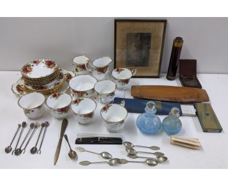A mixed lot to include a two-drawer telescope, compass, Royal Albert Old Country Roses, Caithness bottles, cutlery and other 