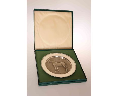 RACING INTEREST: A SILVER COMMEMORATIVE DISH, DAHLIA, hallmarked for Roberts & Dore, London 1974, the well with an image of t