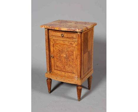 A BURR WALNUT AND MARBLE TOPPED POT CUPBOARD, the moulded top with serpentine front above a drawer over a cupboard door with 