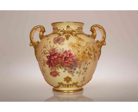 A ROYAL WORCESTER BLUSH IVORY VASE, CIRCA 1896, with twin handles and moulded with scrolls, painted with a floral spray to th