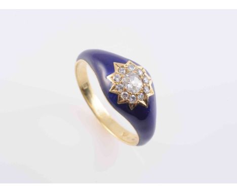 AN ENAMEL AND DIAMOND RING, the tapering oval mount of blue enamelling set to the centre with a ten-pointed star shaped mount