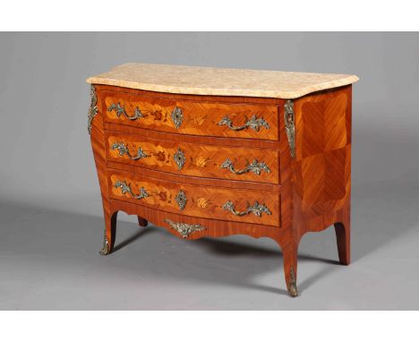 A LOUIS XV STYLE GILT-METAL MOUNTED, FLORAL MARQUETRY AND MARBLE-TOPPED COMMODE, of serpentine form, fitted with three long d