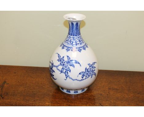 A MING STYLE "BIRD AND FLOWER" YUHUCHUNPING VASE, blue painted with birds on blossoming branches. 25cm