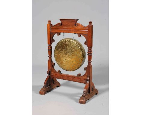 A LATE VICTORIAN MAHOGANY DINNER GONG, with architectural crest, no beater. 93.5cm