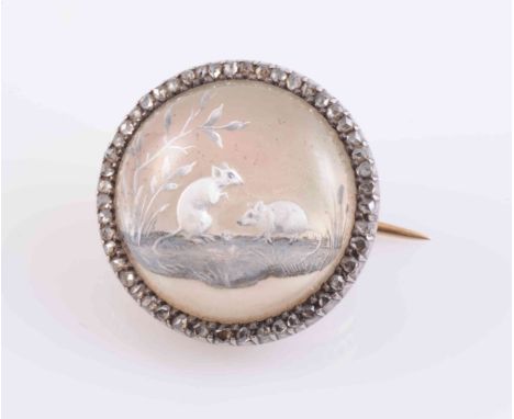 A REVERSE INTAGLIO BROOCH, circa 1870-1880, the circular domed mount depicting two mice against a backdrop of foliage, all se