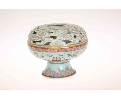 A CHINESE FAMILLE ROSE PORCELAIN CENSER AND COVER, with celadon ground, the domed cover moulded and pierced with clouds, the 