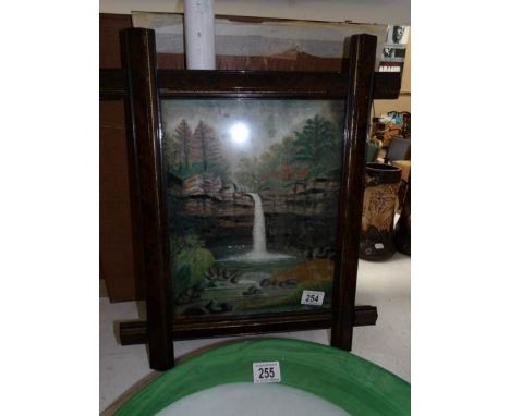 A framed mixed media waterfall painting signed R Pind