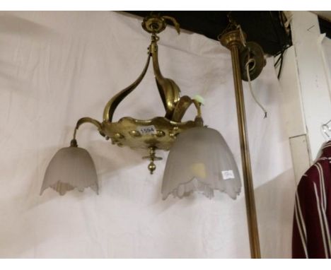 An art deco brass ceiling light