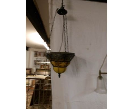 A metal and glass ceiling light