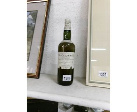 A bottle of "Black and Whites - Buchanans- whiskey, 1960's