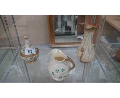 A Belleek cream jug and 2 Royal Worcester pieces