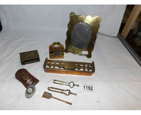 A mixed lot of small brass items including photo framed, fender and miniature fire irons