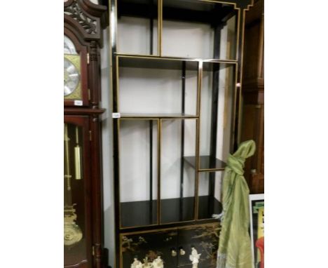 A lacquered shelf unit