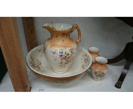 A Victorian jug and basin set
