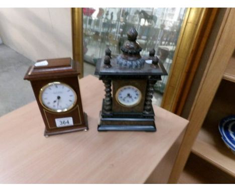 A mahogany inlaid mantel clock and a marble effect mantel clock
