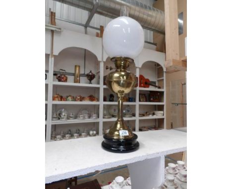 A brass oil lamp