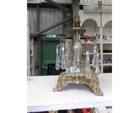 An ornate gilt and marble table lamp base