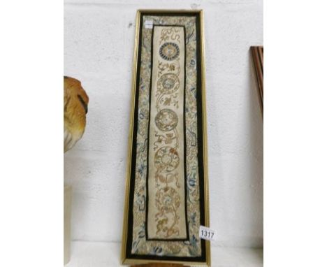 An early 1900's Oriental embroidered panel