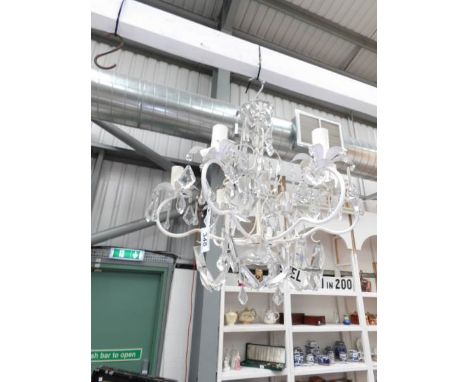 A 6 light metal and glass chandelier